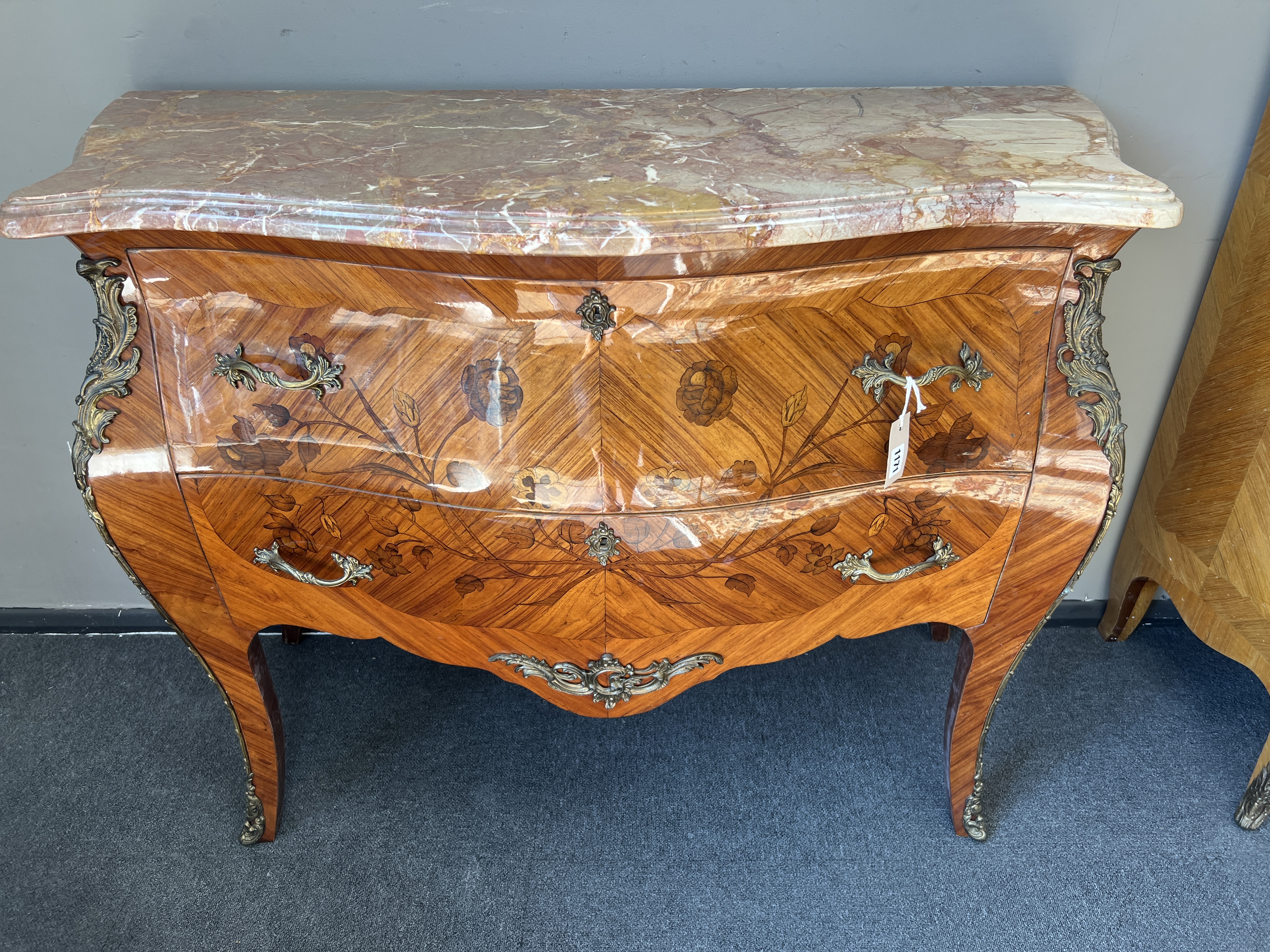 A Louis XV style inlaid kingwood bombe serpentine marble top commode, width 116cm, depth 49cm, height 87cm